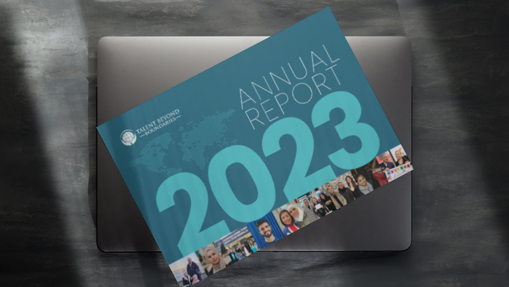 Cover of a 2023 annual report titled 'Talent Beyond Boundaries' with a blue background, large years '2022-2023', a world map outline, and photos of diverse people at the bottom.